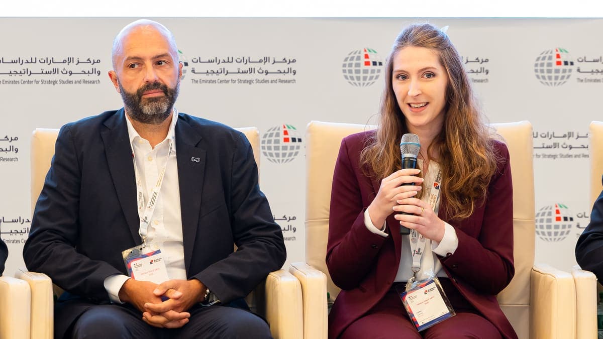 Dr. Justine Sarrau speaking on the panel at the UAE-French Space Days, ECSSR, Abu Dhabi
